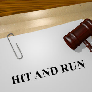 Gavel and file labeled hit and run on the desk of a Lackawanna hit and run accident lawyer